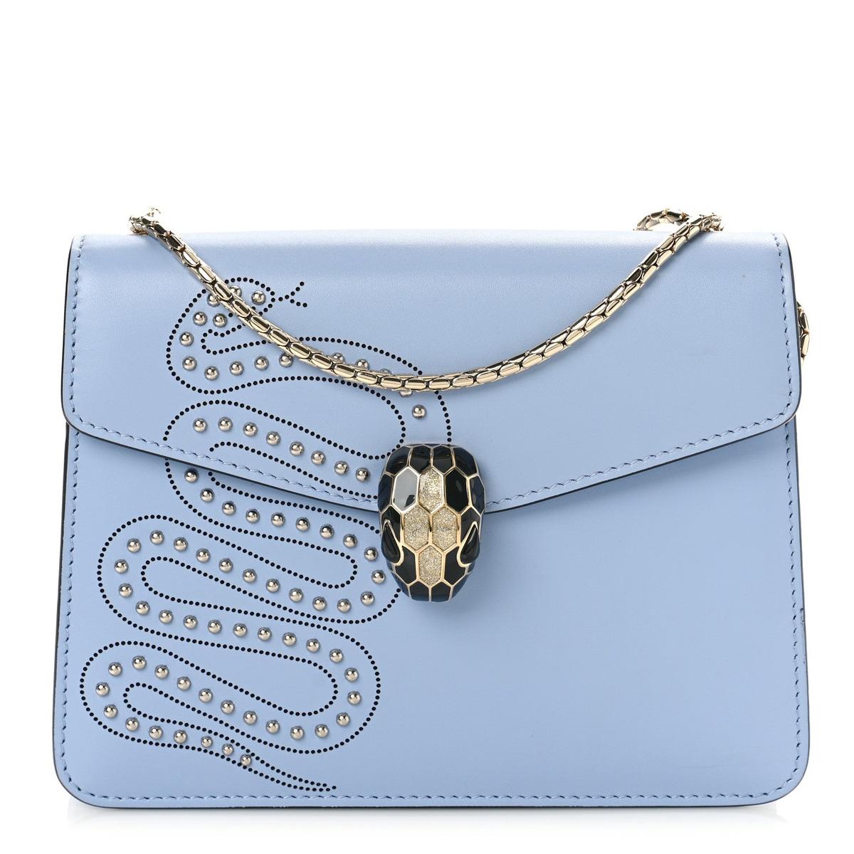 Front view of Bvlgari Serpenti Forever embellished crossbody bag in light blue calfskin