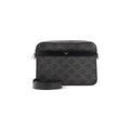 3/4 front view — dark Triomphe canvas messenger bag with CELINE PARIS label