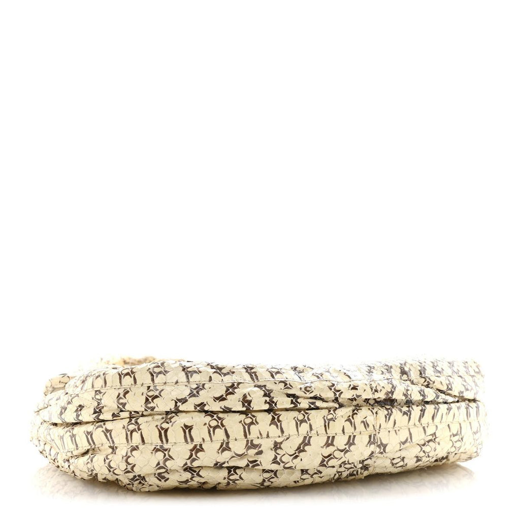 Side view showing snakeskin matelasse quilted texture