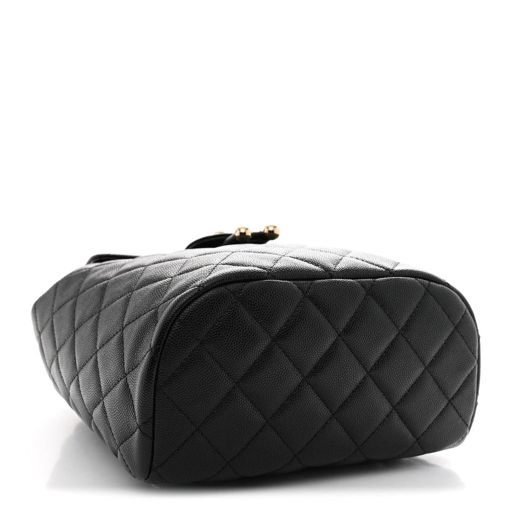Chanel Urban Spirit Backpack Black Caviar Leather — top-down angled view