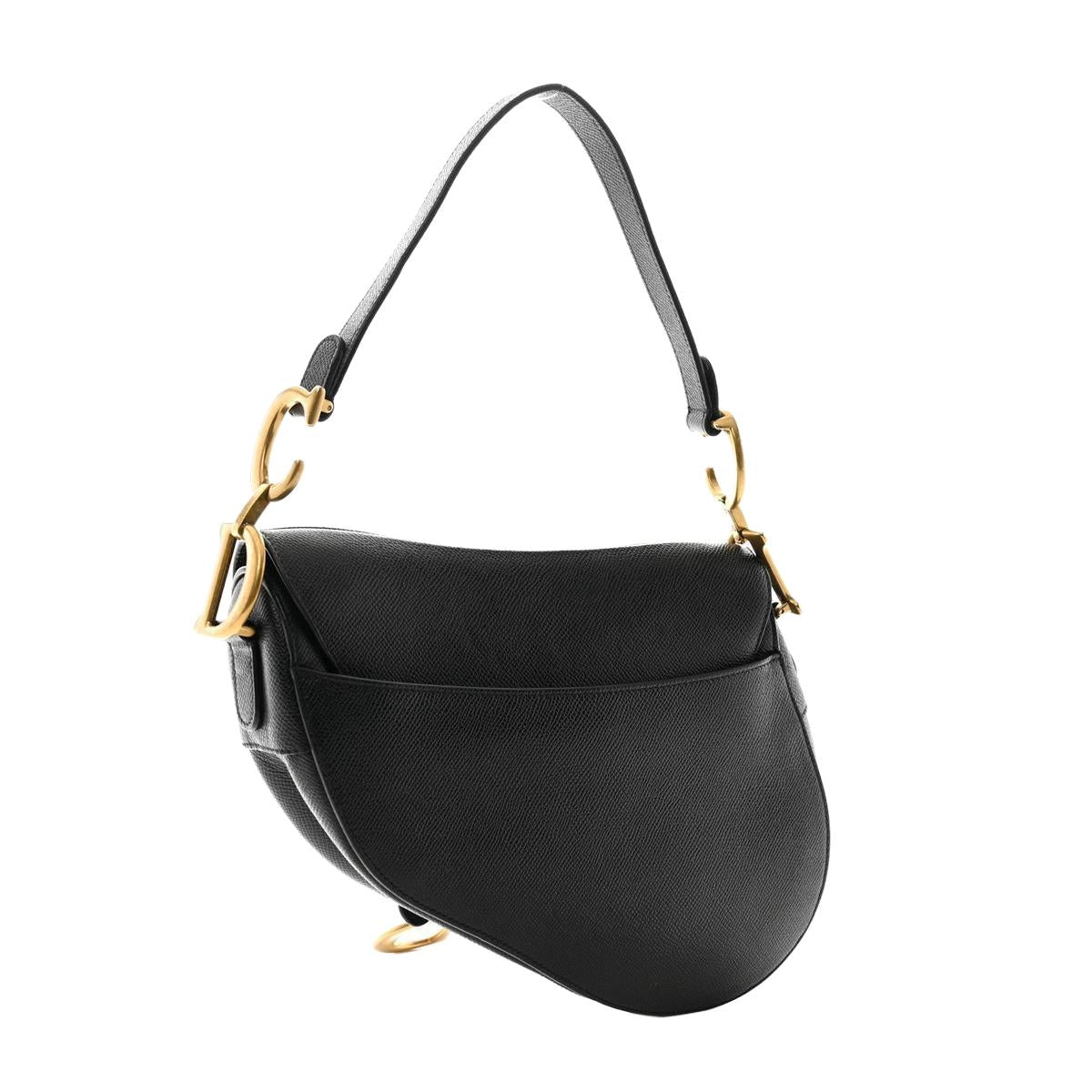 Back view — Dior Saddle Bag Small in black grained calfskin with antique gold-tone D stirrup and adjustable shoulder strap