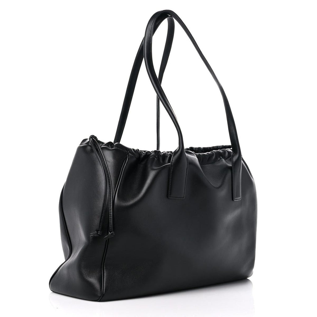 3/4 side view — Celine Compact Tote in Cuir Triomphe black smooth calfskin with drawstring
