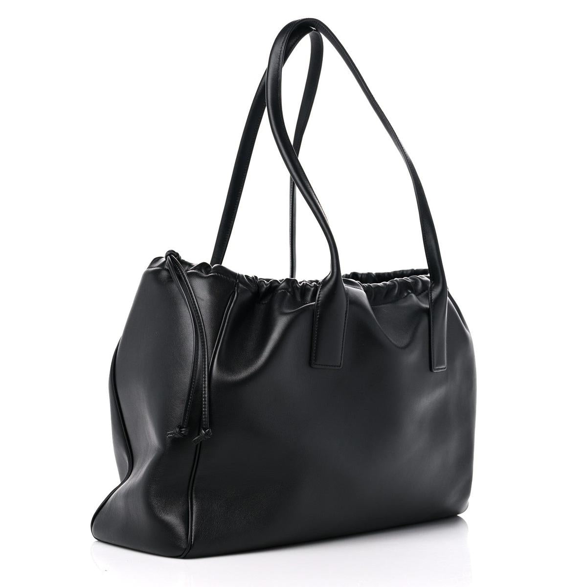 3/4 side view — Celine Compact Tote in Cuir Triomphe black smooth calfskin with drawstring