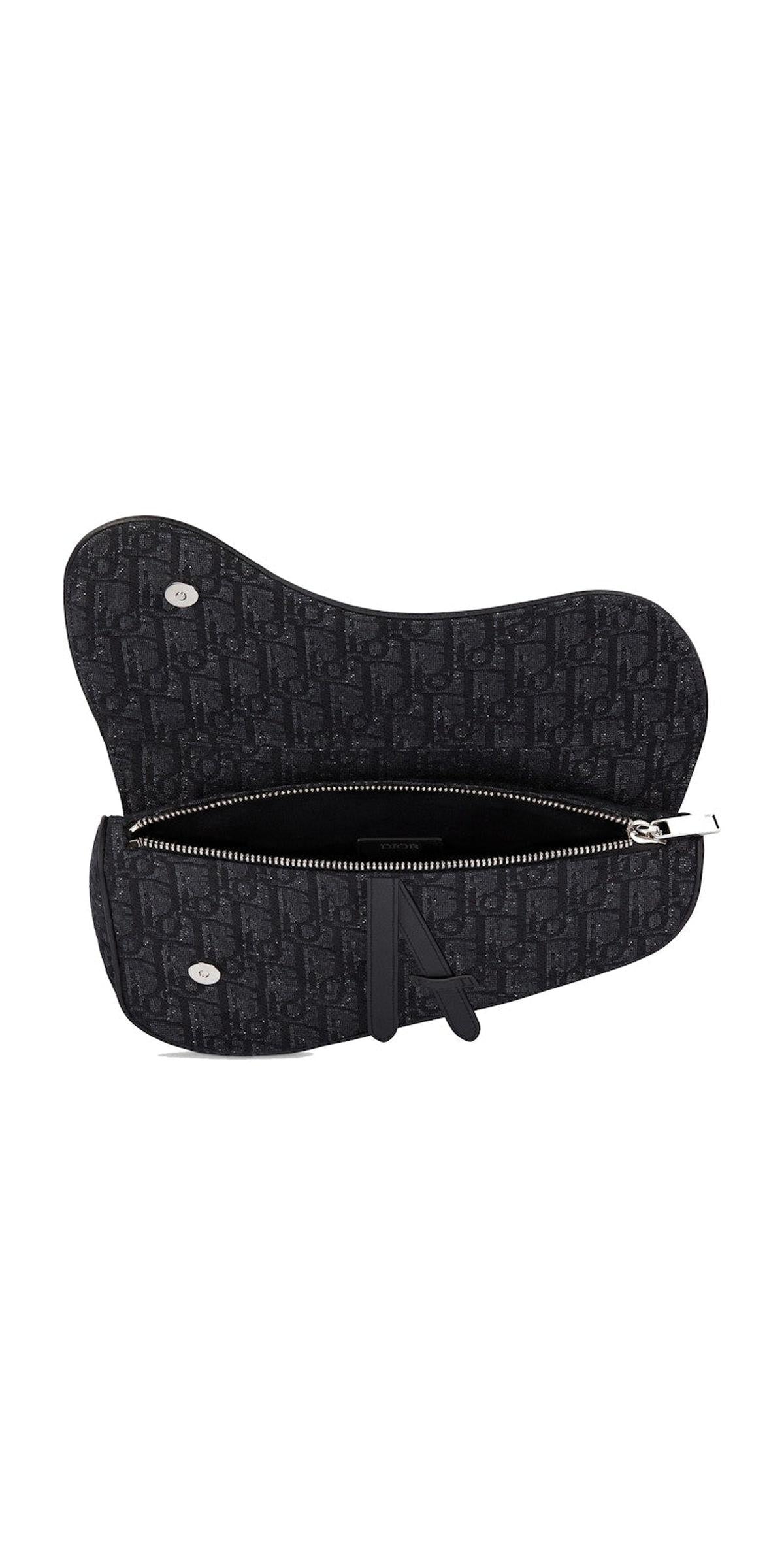 Open/interior view — Dior Saddle Bag in black Oblique canvas with zip main compartment and silver-tone hardware