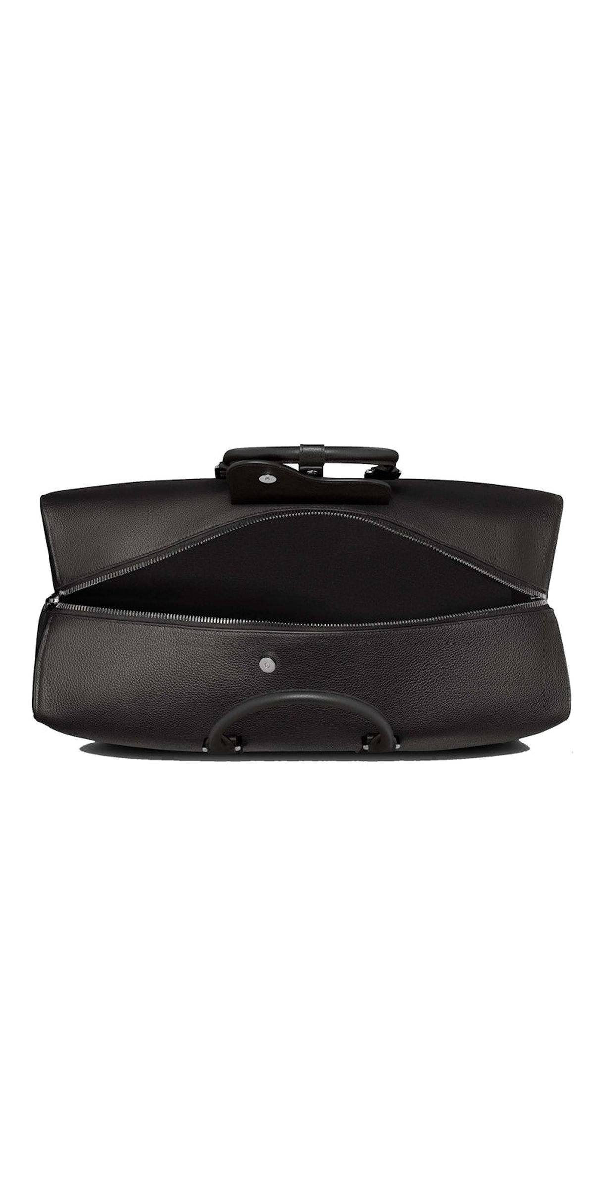 Open/interior view — Dior x ERL Lingot 50 Weekend Bag in black grained leather with ERL daisy motif and zip-top closure