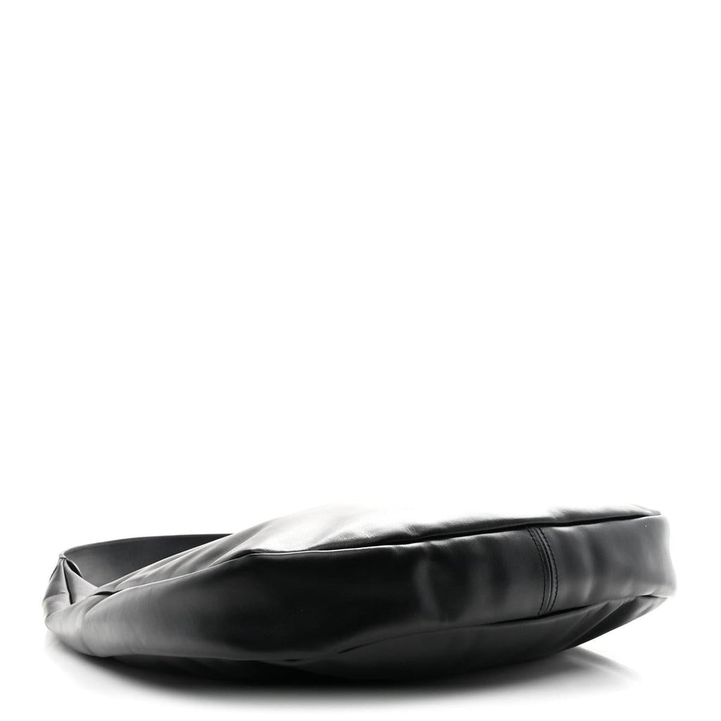 Side view showing soft nappa leather and bag profile