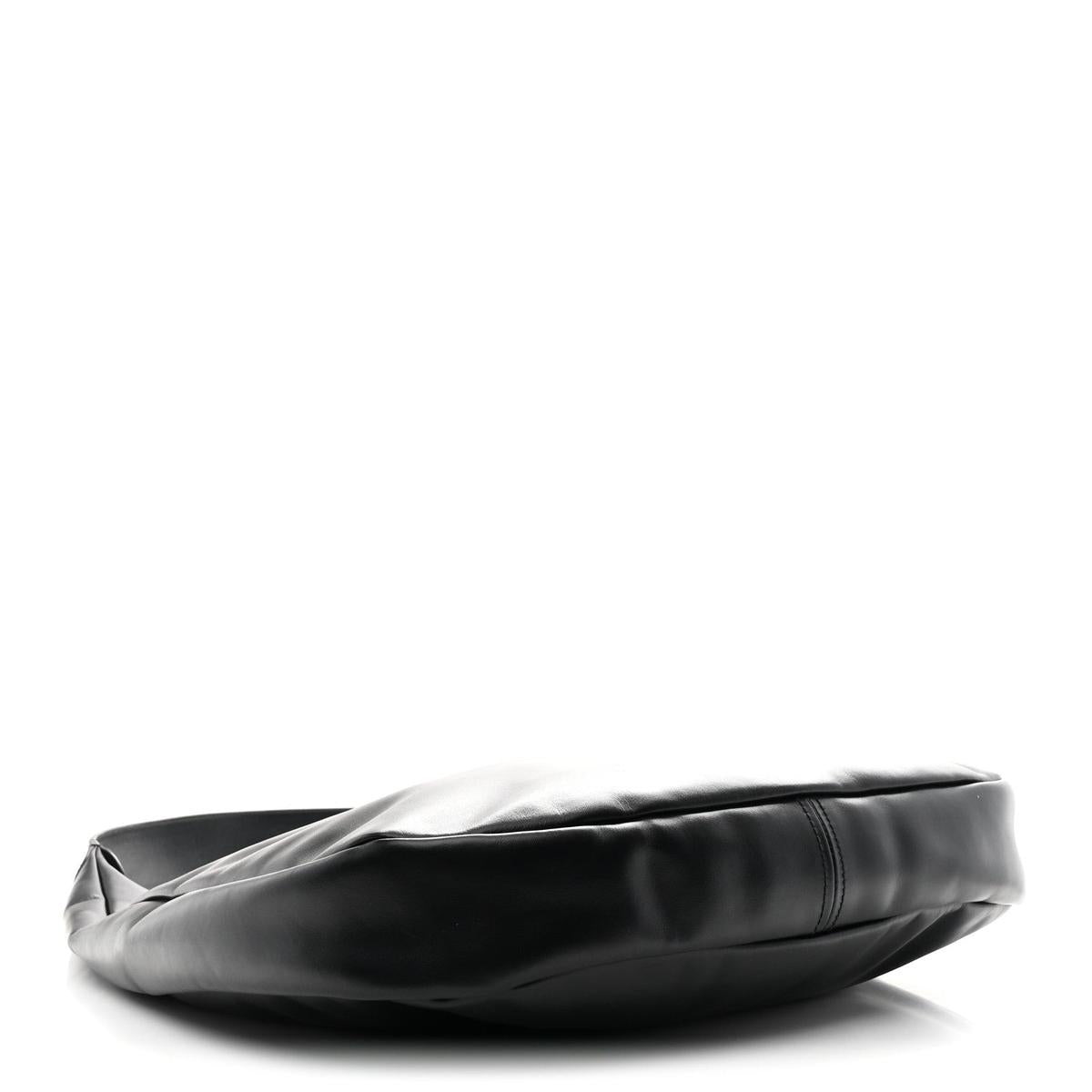Side view showing soft nappa leather and bag profile