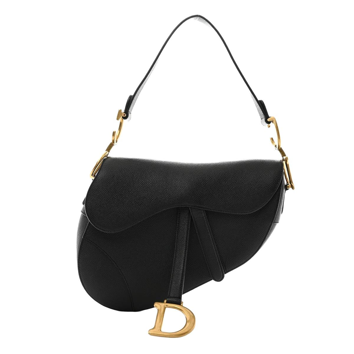 3/4 front view with strap — Dior Saddle Bag Medium in black grained calfskin with antique gold-tone D stirrup and adjustable shoulder strap