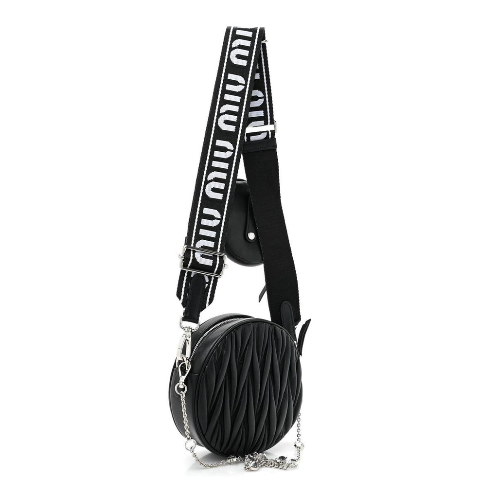 Side 3/4 view with logo strap and crystal chain detail