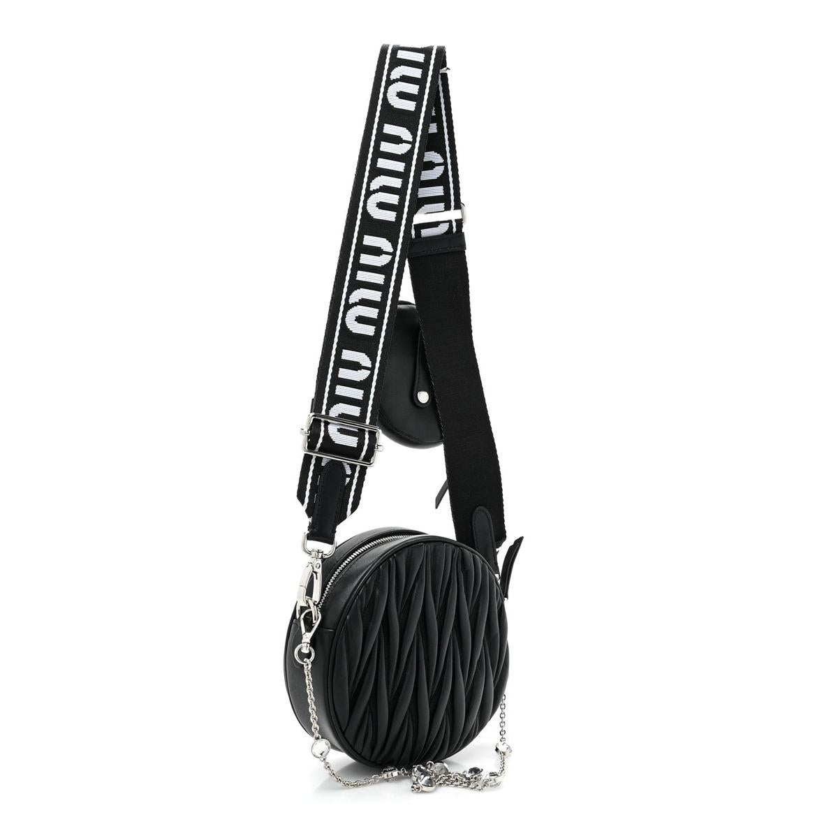Side 3/4 view with logo strap and crystal chain detail